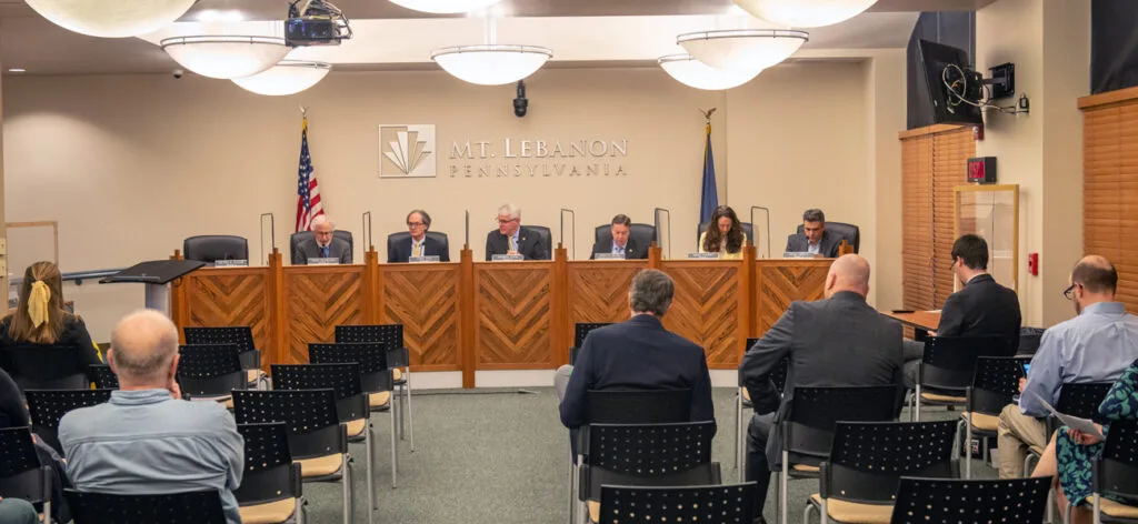 The Mt. Lebanon Commission in session, residents seated in the chamber.